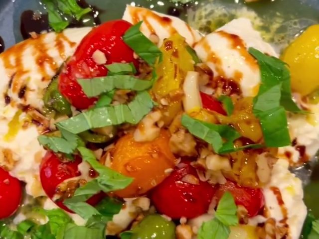 Roasted cherry tomato olive topped burrata