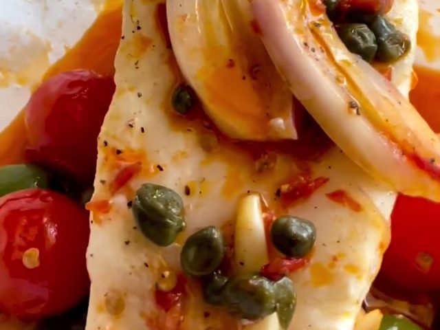 Mediterranean fish in parchment parcels