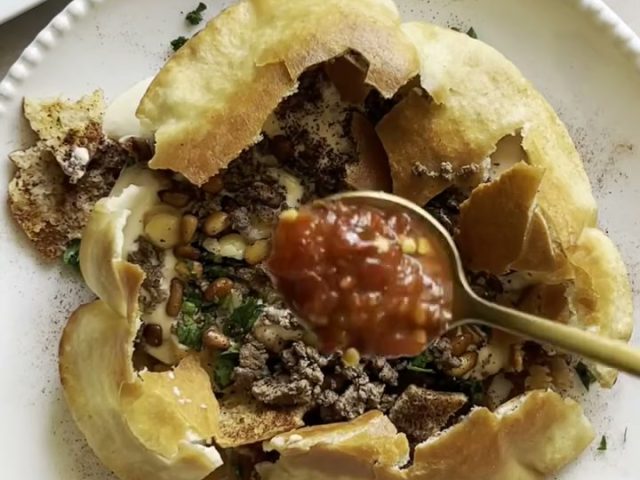 Fattet hummus in a pita shell